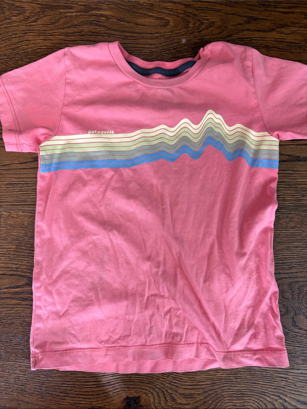 Patagonia Kids Coral Pink Tee with Multicolor Stripe Graphic